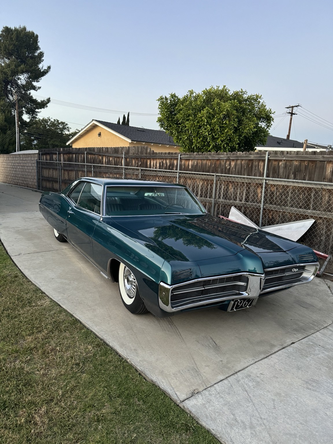 Green Pontiac Grand Prix: front three-quarter